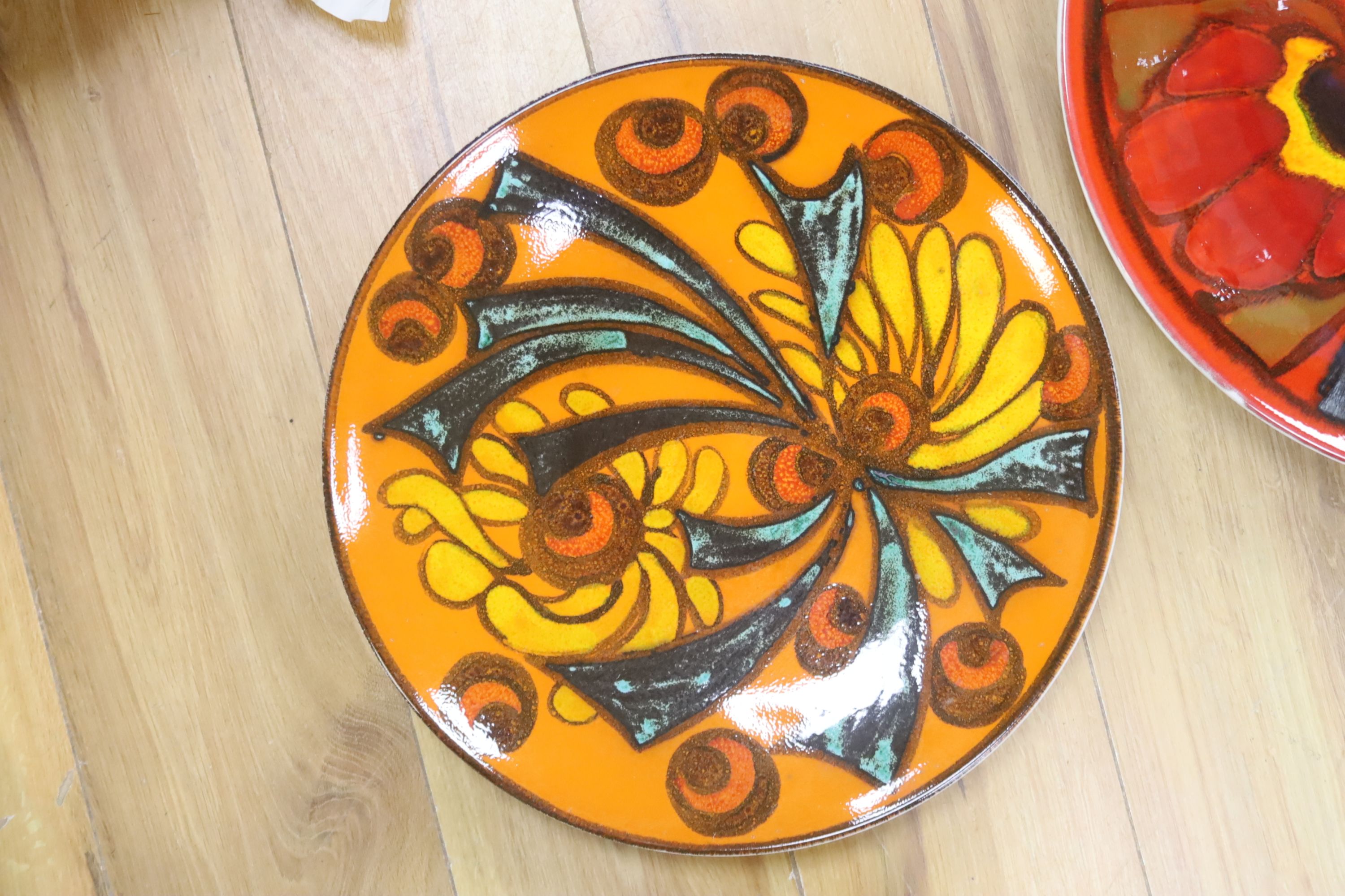 Two Poole Delphis dishes, 36.5 and 41cm